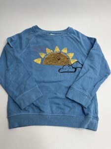 Pullover mit Sonne aus Wendepailetten